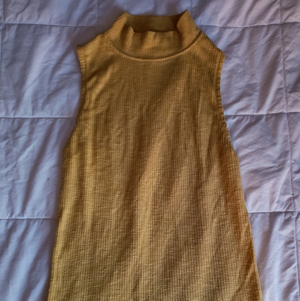 Yellow sleeveless turtle neck
